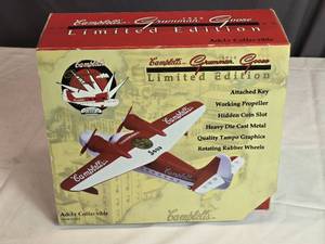 lot 23 image: 1938 Campbells Grumman Goose Die-Cast Airplane Bank with Key, In Package