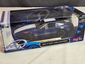 lot 34 image: Maisto 1996 Corvette Coupe 118 Scale Diecast Model in Special Edition Packaging