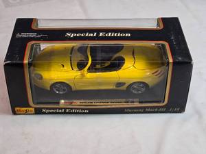lot 47 image: Maisto Special Edition Ford Mustang Mach III 118 Scale Diecast Model in Yellow