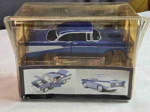 lot 56 image: Gold Series 1957 Chevy Bel Aire 118 Scale Diecast Model in Blue