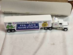 lot 75 image: ERTL FFA Experience the Action Fifth Edition Die-Cast Truck Ford Cab with Drop-Bed Trailer