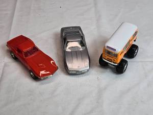 lot 119 image: Lot of 2 Plastic Corvettes and Commercials International Group Bus