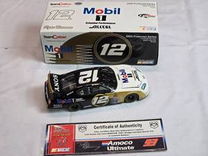 lot 128 image: Team Caliber 124 Scale Die-Cast Stock Car, Ryan Newman #12 Mobil 1, 2005 Preferred Series