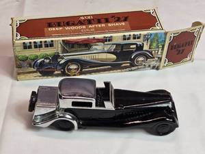 lot 136 image: Avon Bugatti 27 Deep Woods After Shave Bottle