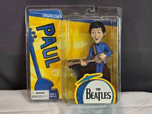 lot 149 image: McFarlane Toys Beatles Paul Action Figure