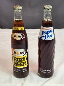 lot 153 image: Vintage A&W Root Beer and Pepsi Free Bottles (1970s)
