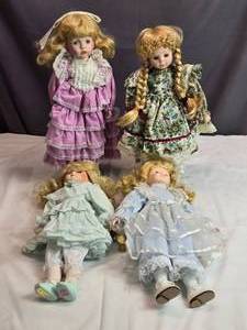 lot 166 image: Lot of 4 Porcelain Dolls in Vintage Clothing