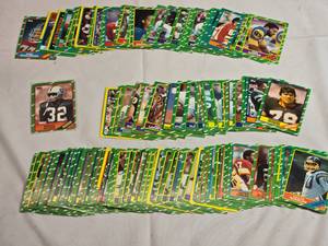 lot 210 image: Lot of 100 - 1986 Topps Football