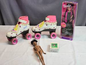 lot 227 image: Barbie Roller Skates, 2003 Barbie My Graduation