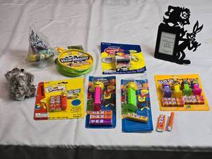 lot 230 image: Pez Dispensers, Bugs Bunny Picture Frame and More