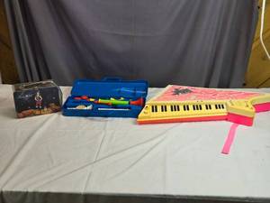 lot 231 image: Girl XC Lunchbox, Fischer Price Crazy Horn Set (Not Complete), Jem Piano (Untested)