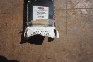 lot 68 image: Lincoln Model LE07126 18 5 lb Welding Rods