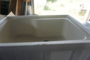 lot 75 image: Swan Brand 33 Fiberglass Laundry TubSink