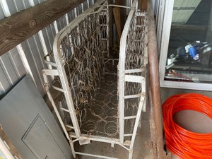 lot 136 image: Roll Away Bed Box Spring With Antique Head Board