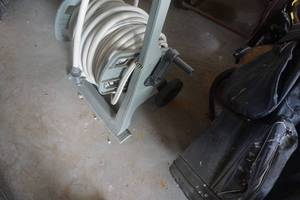 lot 179 image: Plastic Hose Reel With Garden Hose
