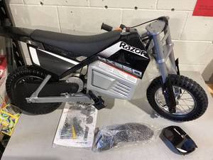 lot 542 image: Razor Dirt Rocket MX350 - Black with Decals Included, 24V Electric-Powered Dirt Bike