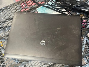 lot 2 image: lap top turns on but no password