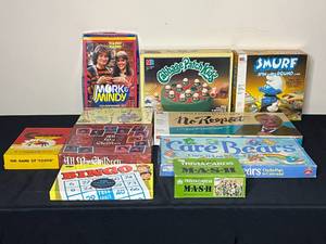 lot 59 image: Level 2 - Vintage Board Game Lot - Cabbage Patch Kids, Care Bears, Mork and Mindy, and More