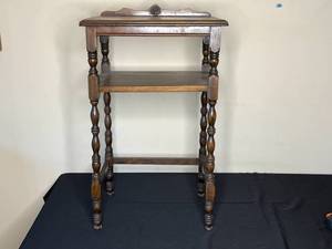 lot 99 image: Level 3 - Antique Dark Wood Two-Tier Shelf with Decorative Backing