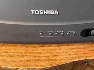 lot 3 image: Level 3 - 33 Toshiba CRT TV on Antique Wooden Dresser