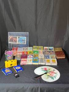 lot 242 image: Level 2 - Vintage Playing Cards, ET Cards, Camel GT 35mm Camera & More