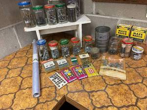 lot 15 image: Level 1 - Lot of Assorted Screws, Nails, and Fasteners