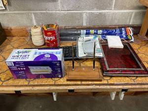 lot 20 image: Level 1 - Assorted Household and Office Items with Swiffer WetJet, Brother Label Maker, and Pipe Insulation