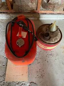 lot 330 image: Garage - Lot of 2 Vintage Gas Cans - Johnson Gasoline Can and Metal Can with Funnel
