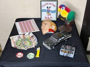 lot 415 image: Level 2 - Variety Lot Vintage Elvis Stamps Ad, RC Car, Mask, and More