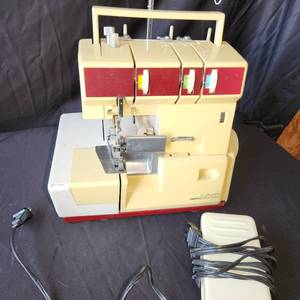 lot 11 image: Vintage Happy Lock Surger Sewing Machine