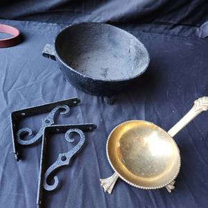 lot 24 image: Cast iron and brass () bowls plus brackets as shown.