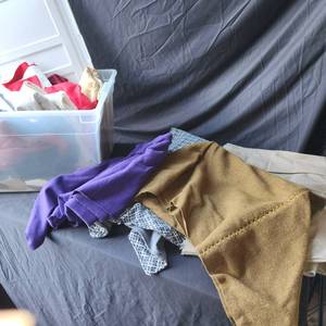 lot 34 image: Various fabric remnants as shown.