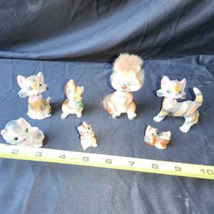 lot 41 image: Creepy, Porcelain cat and squirrel figurines.