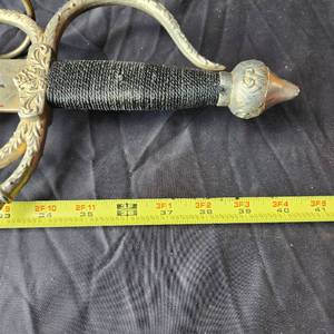 lot 77 image: Decorative embossed sword replica