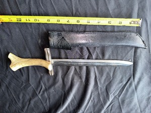 lot 90 image: Everyday eating dagger with hornantler () hilt with scabbard as shown.