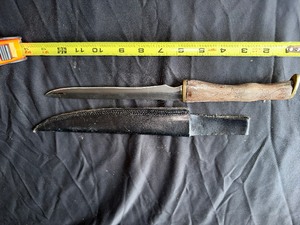 lot 91 image: Small dagger with scabbard as pictured