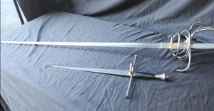 lot 52 image: Italian style Rapier and dagger as shown for stage combat or training.