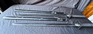 lot 64 image: 2 Prop Ninjago swords with scabbards