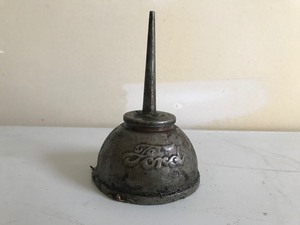 lot 43 image: Vintage Ford thumb press oil can