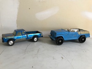 lot 56 image: Nylint metal truck and Tonka Jeepster toys