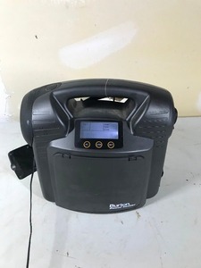 lot 65 image: New power center 12 amp battery spotlight, jump starting cables, 100 watt outlet