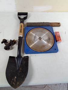 lot 295 image: Small Craftsman Shovel, No.9 Saw Blades. Box pf Staples, Sanding Block, Duel Water Spout