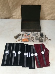 lot 197 image: Metal box of Vintage marbles, keys & advertised watches