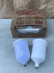 lot 229 image: Box of Disposable Plastic Wheel covers & 2 Paint Sprayer cups