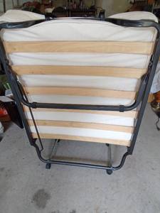 lot 236 image: Twin roll away bed