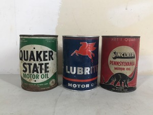 lot 94 image: Sinclair, Quaker State oil cans Full