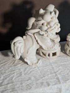 lot 116 image: White Glaze Porcelain Foo Dogs Statues