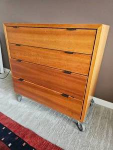 lot 64 image: Modern Contemporary 4 Drawer Dresser on Overesized Casters