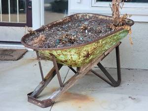 lot 179 image: Rustic Garden Wheelbarrow Planter