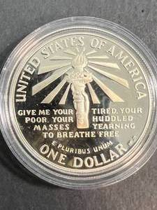 1986-S PROOF US ELLIS ISLAND COMMEM SILVER DOLLAR IN AIRTITE